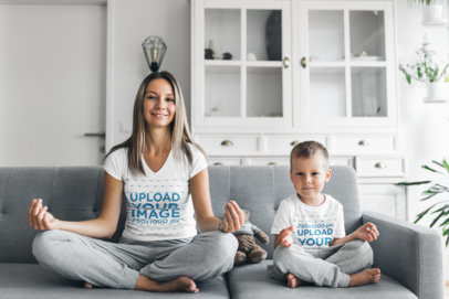 T-Shirt Mockup Featuring a Mom and Her Son Doing Yoga in the Living Room 