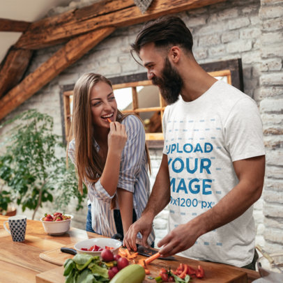T-Shirt Mockup of a Bearded Man Cooking with His Girlfriend