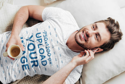 V-Neck Tee Mockup Featuring a Man Lying on a Bed Listening to Music 43896-r-el2