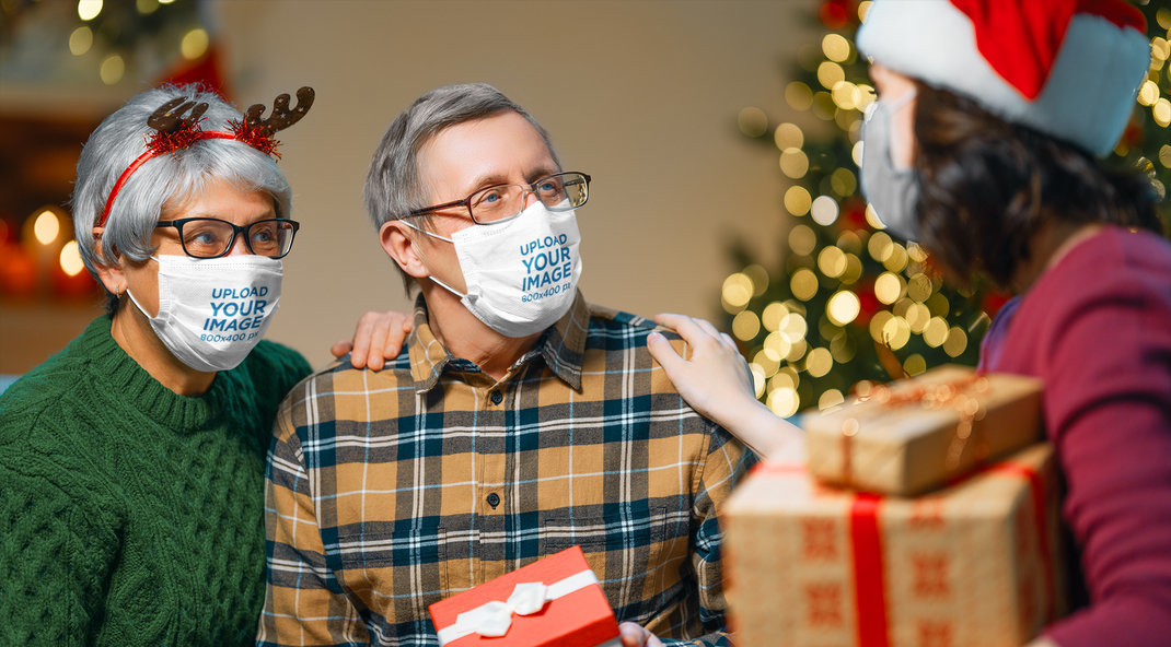 Mockup of a Senior Couple Wearing Face Masks on Christmas Day