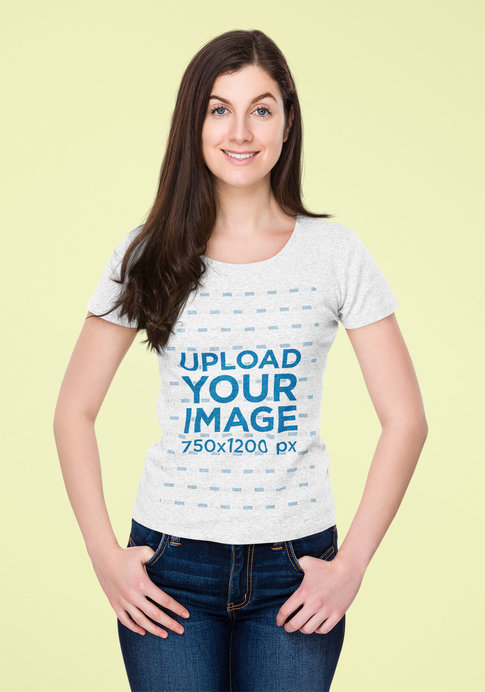 Mockup of a Smiling Woman Wearing a Heather Tee in a Studio