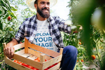 T-Shirt Mockup Featuring a Bearded Farmer Collecting Tomatoes 