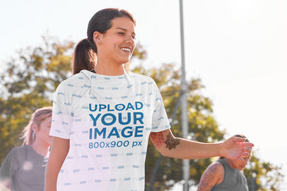 Sublimated T-Shirt Mockup of a Woman Working Out Outside 43916-r-el2