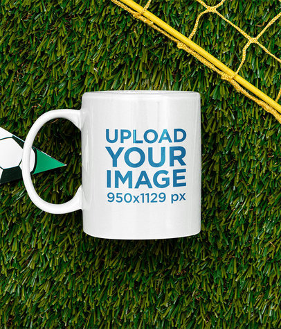 Mockup of an 11 oz Coffee Mug Placed on a Soccer Field