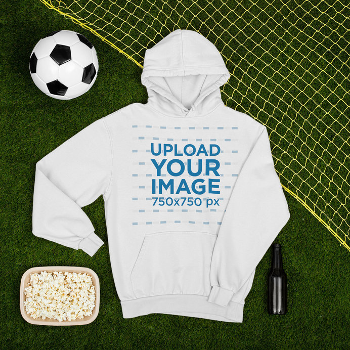 Pullover Hoodie Mockup Featuring a Soccer Ball and a Popcorn Bowl 