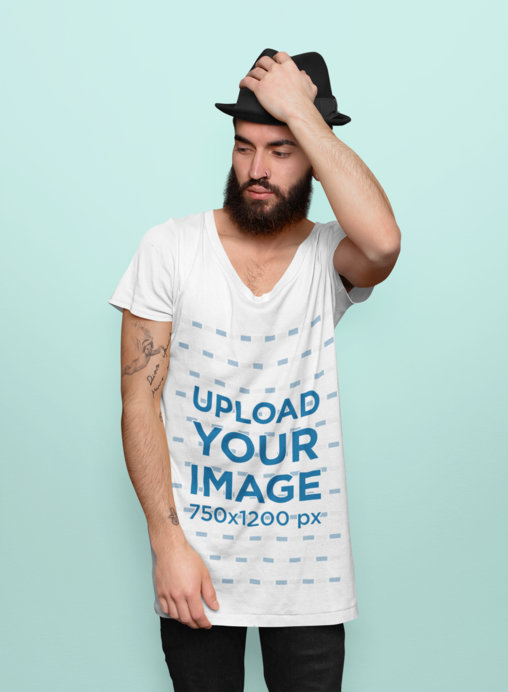 Scoop Neck T-Shirt Mockup of a Tattooed Man Posing at a Studio 