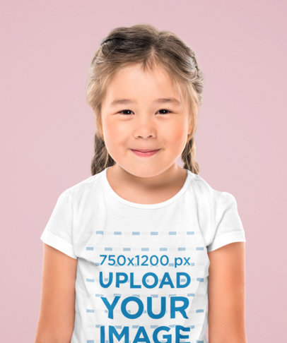 Mockup of a Little Girl Wearing a T-Shirt at a Studio 44447-r-el2