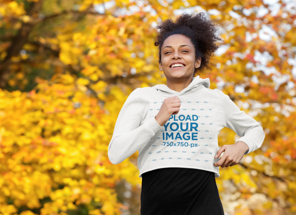 Crop Top Hoodie Mockup of a Woman Running Outdoors