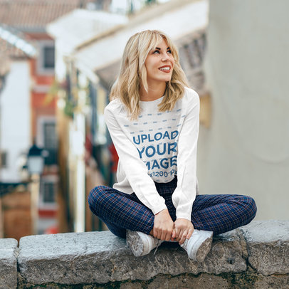 Long-Sleeve Tee Mockup of a Woman Admiring a City View