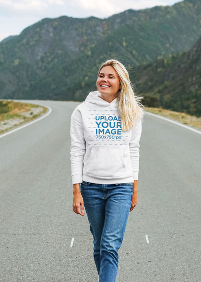 Hoodie Mockup of a Happy Woman Walking in the Middle of the Highway 44485-r-el2