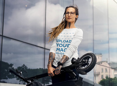 Long Sleeve Tee Mockup of a Tattooed Woman With a Modern Scooter