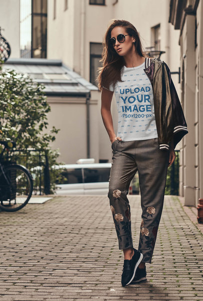 Mockup of a Woman Walking on a Street with a Round Neck T-Shirt 