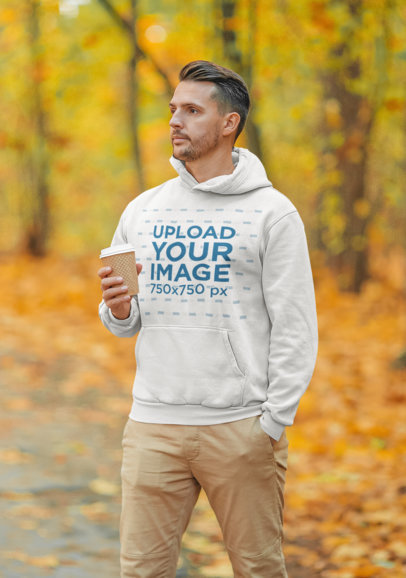 Hoodie Mockup Featuring a Serious Man Walking Through an Autumn Forest 44621-r-el2