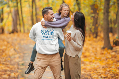 Hoodie Mockup of a Man Walking With His Family in the Forest 44624-r-el2