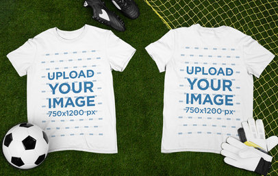 Mockup of Two Round Neck T-Shirts Placed over a Soccer Field
