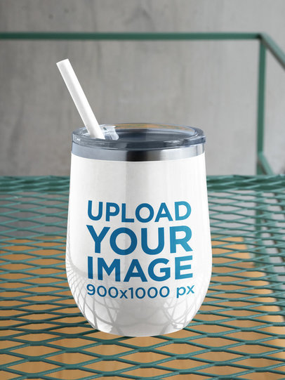 Mockup of a Tumbler with a Straw 