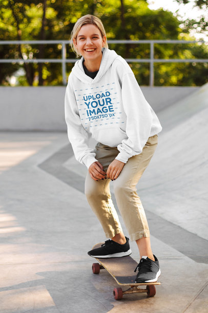 Hoodie Mockup Featuring a Female Skater on a Skatepark