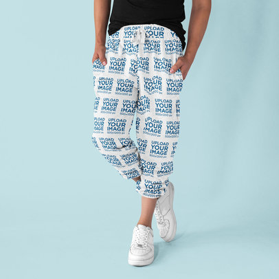 Sweatpants Mockup Featuring a Man Posing in a Studio