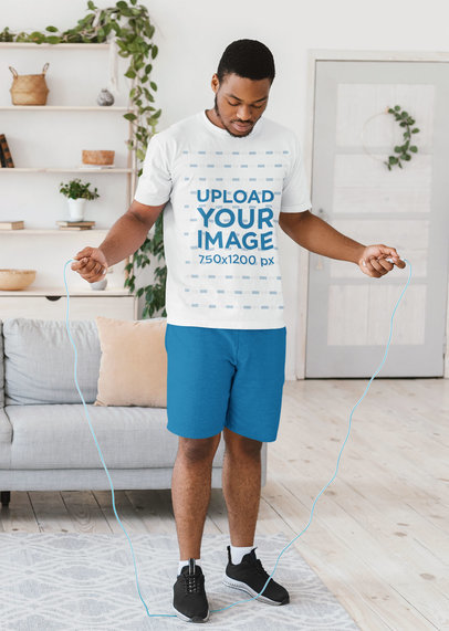 T-Shirt Mockup of a Man Doin a Jumping Rope Workout at Home 44555-r-el2