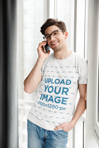 Tee Mockup Featuring a Man Talking on the Phone with His Girlfriend