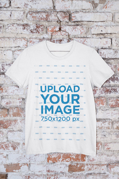Mockup of a Round Neck T-Shirt Hanged by an Old Brick Wall m437