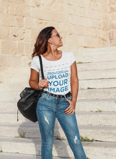 T-Shirt Mockup Featuring a Stylish Woman Posing