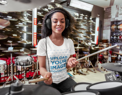 T-Shirt Mockup of a Woman Playing the Drums 
