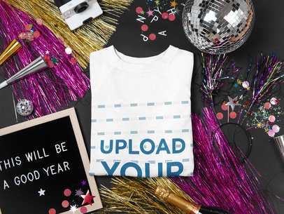Mockup of a Folded Sweatshirt with Party Items All Around m290