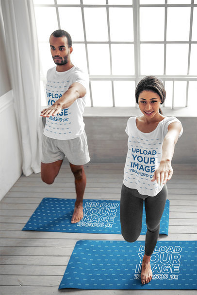 T-Shirt and Yoga Mat Mockup Featuring a Couple Doing Yoga