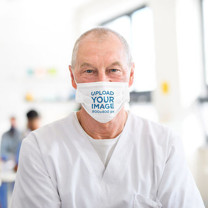Face Mask Mockup Featuring a Senior Doctor 