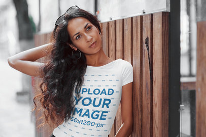 T-Shirt Mockup Featuring a Long-Haired Woman Posing