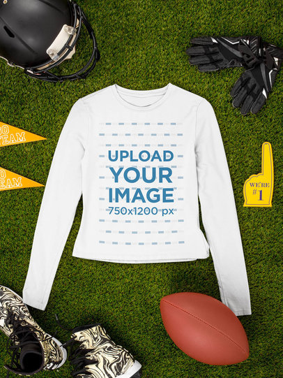 Mockup of a Long Sleeve Tee Flat Laid by Football Equipment