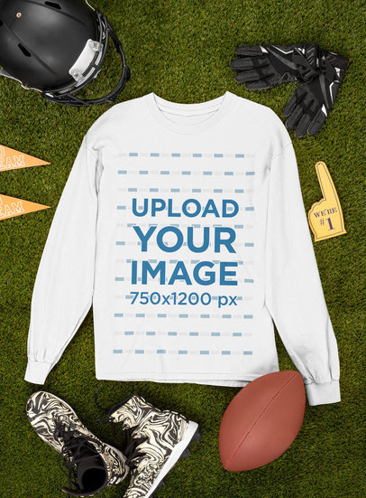 Mockup of a Long Sleeve Tee Surrounded by Football Equipment 