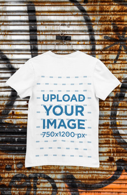 Back-View Mockup of a T-Shirt Hanged on a Rusty Steel Shutter M453
