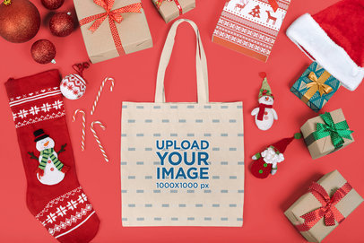 Mockup of a Flat Laid Tote Bag Surrounded by Christmas Decorations m18