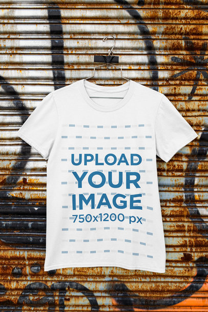 Mockup of a T-Shirt on a Hanger Taped to a Metal Shutter m452