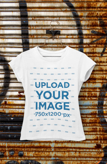 Mockup of a Woman's T-Shirt Hanging from a Steel Shutter m454