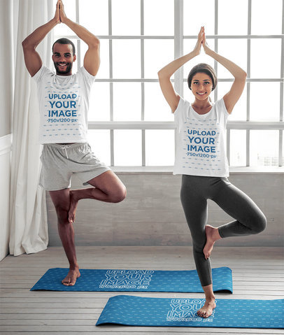 T-Shirt Mockup of a Smiling Couple Standing over Yoga Mats 