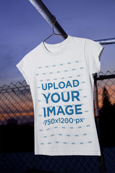 Mockup of a Women's T-Shirt Hanging in a Urban Scenario m485