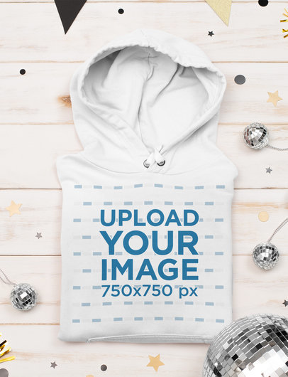 Mockup of a Folded Hoodie Surrounded by Party Items m262
