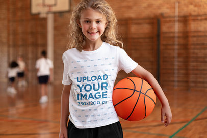T-Shirt Mockup of a Happy Girl at Basketball Practice