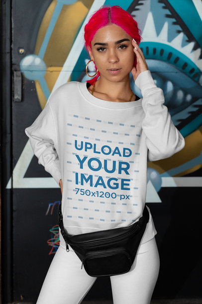 Mockup of a Pink-Haired Woman Wearing a Sweatshirt 