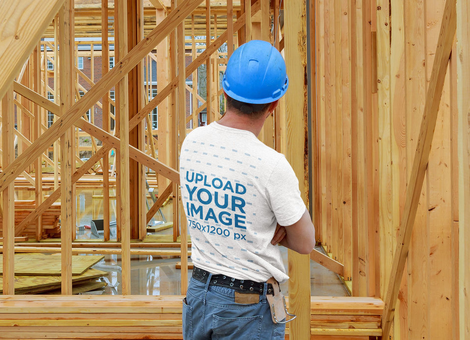 Back View Mockup of a Man Wearing a Heather T-Shirt at a Construction Site 