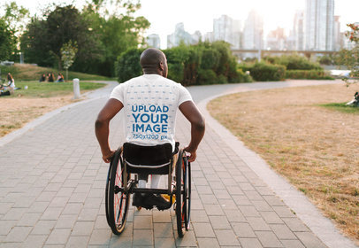 Back-View T-Shirt Mockup Featuring a Man Using a Wheelchair 45092-r-el2