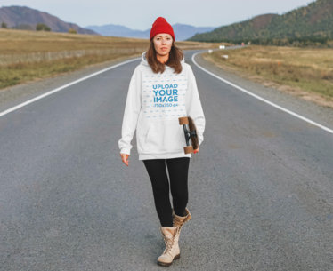 Pullover Hoodie Mockup Featuring a Woman Walking on a Road and Holding a Longboard 45123-r-el2