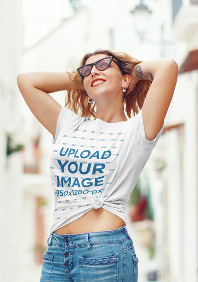 Mockup Featuring a Tattooed Woman Wearing a Knotted T-Shirt and Sunglasses 