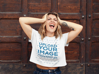 Crop Top Tee Mockup Featuring a Tattooed Woman Screaming 