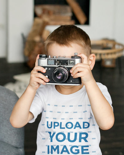 T-Shirt Mockup of a Boy Taking a Picture With an Old Camera 45037-r-el2