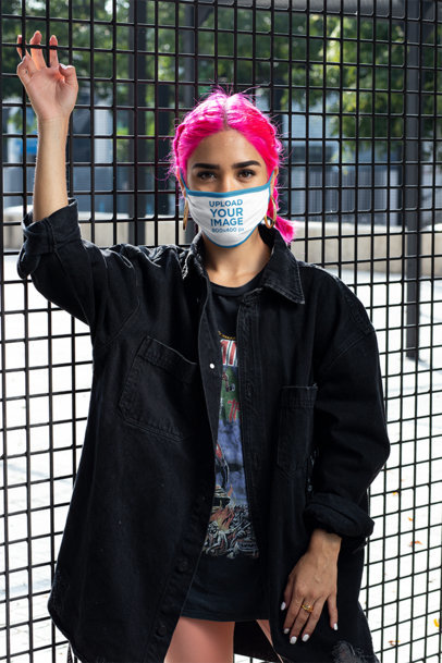 Mockup of a Woman with Pink Dyed Hair Wearing a Face Mask 