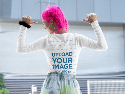 Back-View Mockup of a Woman Pointing at Her Long Sleeve Tee 